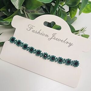 Chic Floral Bracelet with Green Accents